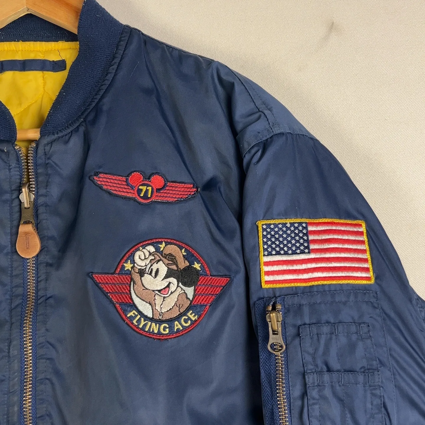 Disney — Giacca a vento con patch e zip blu — 2