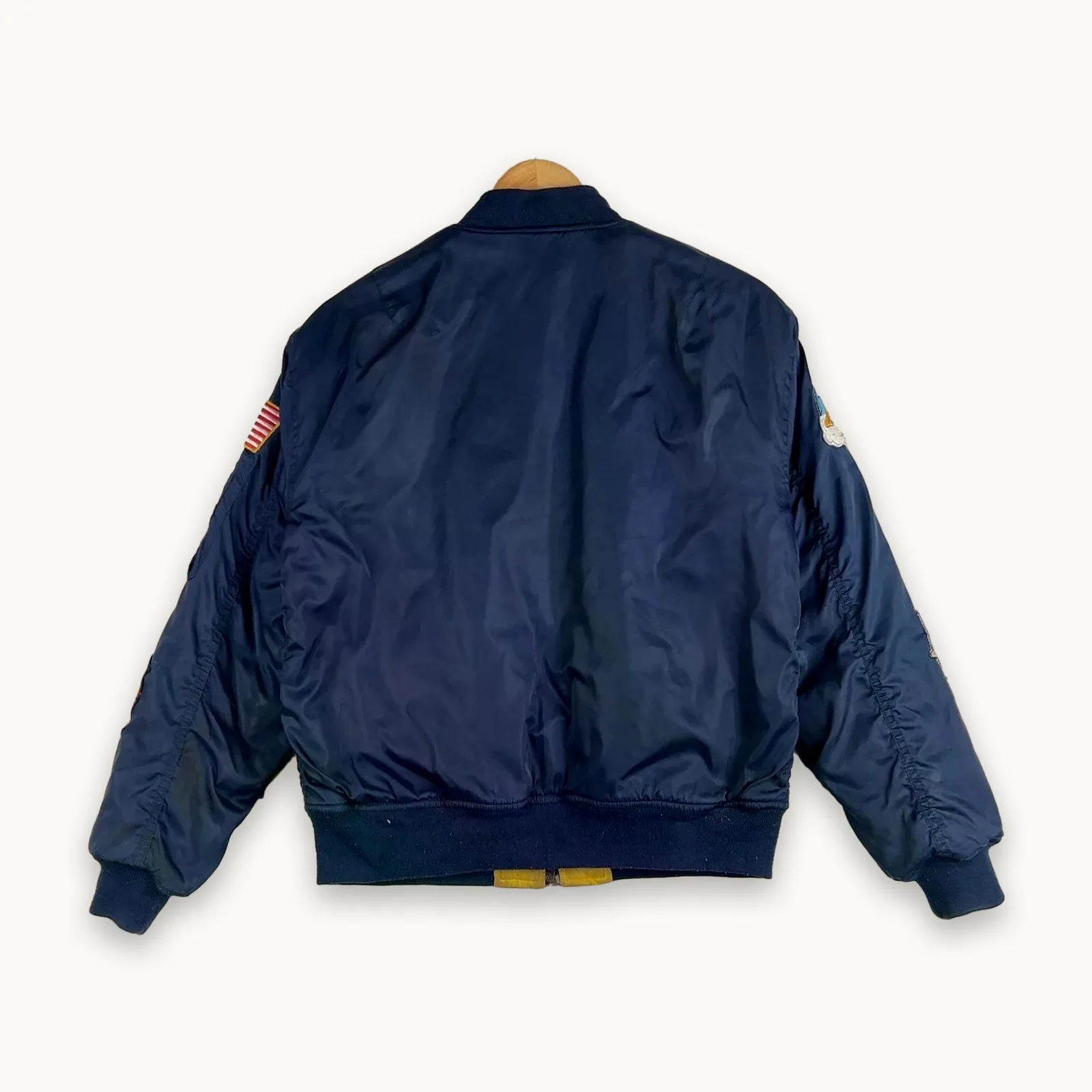 Disney — Giacca a vento con patch e zip blu
