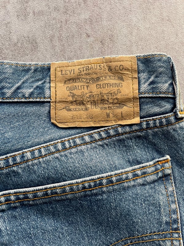 Levis blue jeans  615 ORANGE TAG — 8